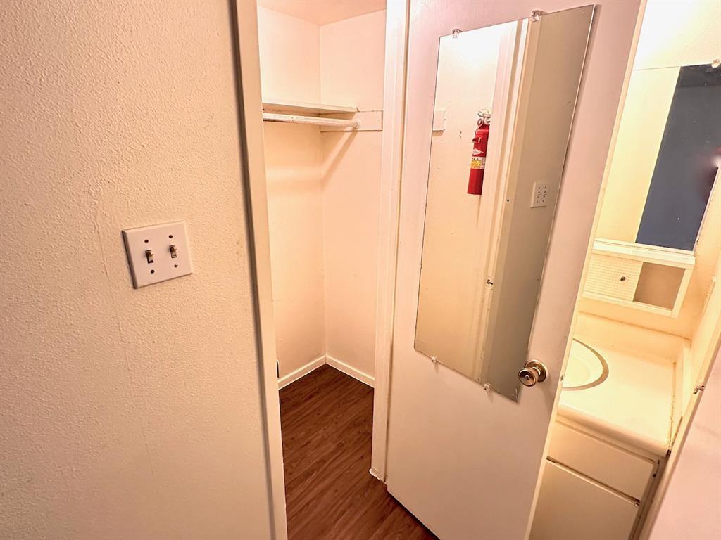 4204 Speedway, Unit 204 Austin, TX 78751 - Photo 8 of 13 a view of a hallway with wooden floor