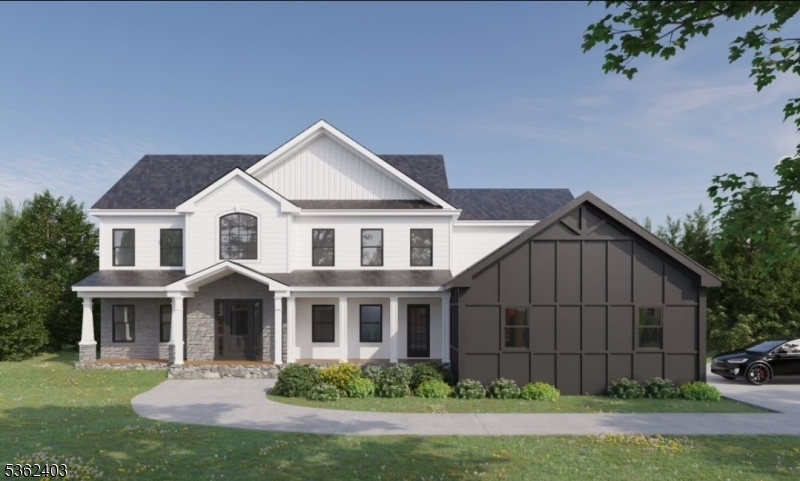 a front view of a house with a yard and plants