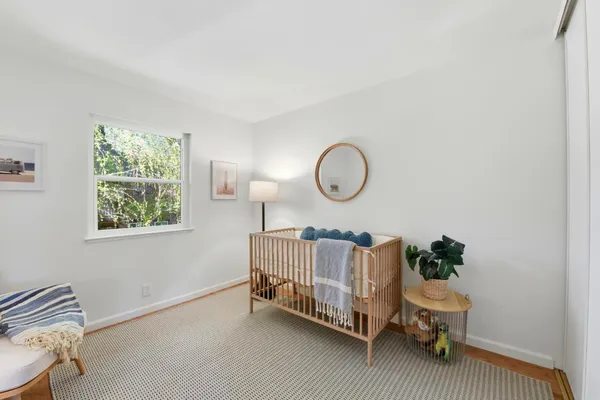 a bedroom with a bed and furniture