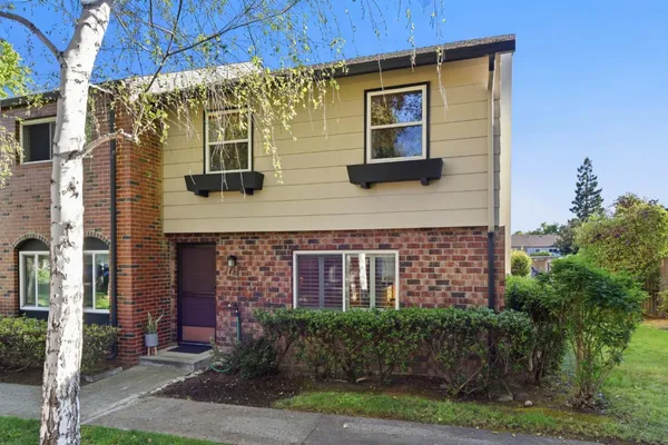 a brick building with a large windows