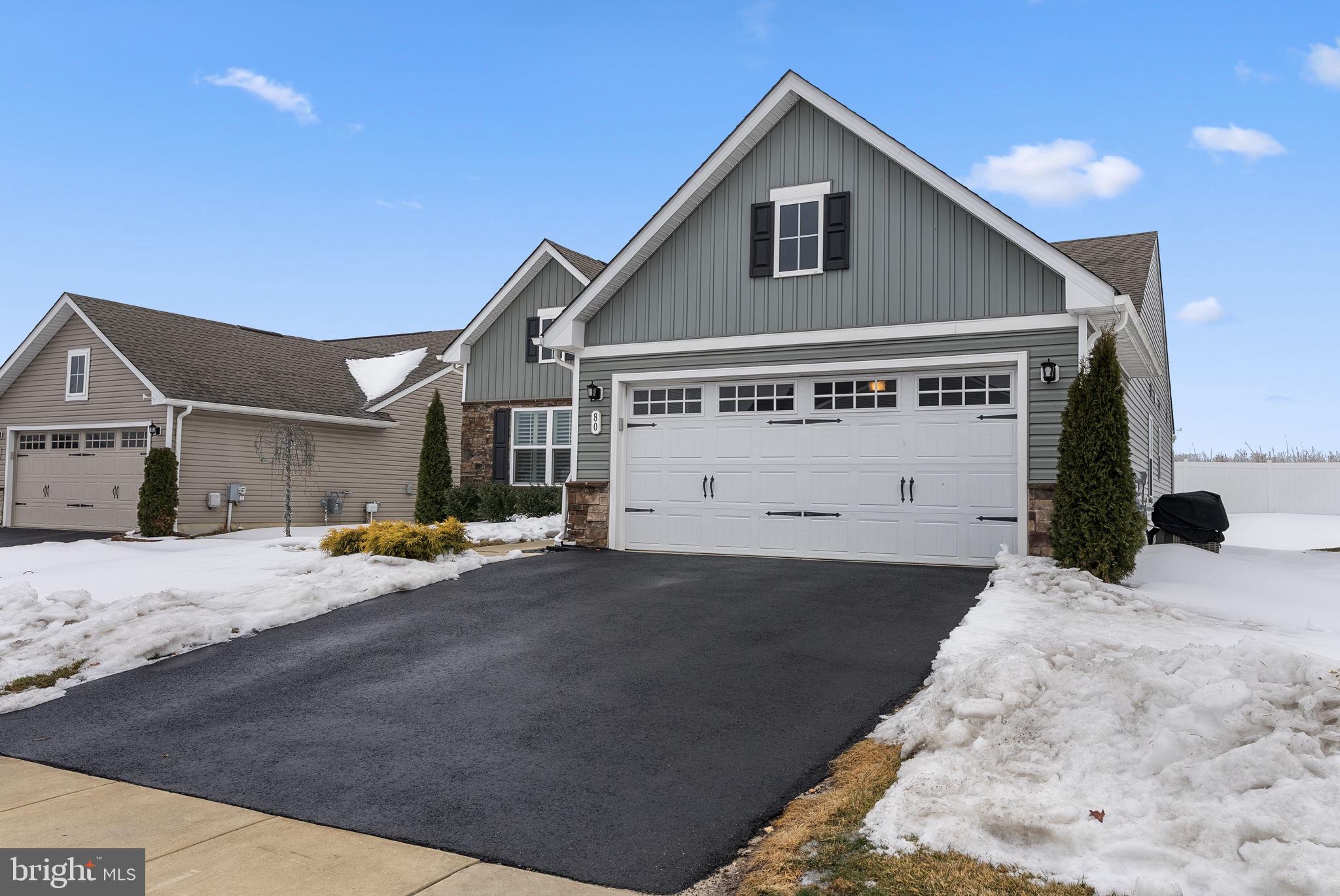 80 Senators Way Berlin, NJ 08009 - Photo 2 of 29 a view of a house with a snow in the background