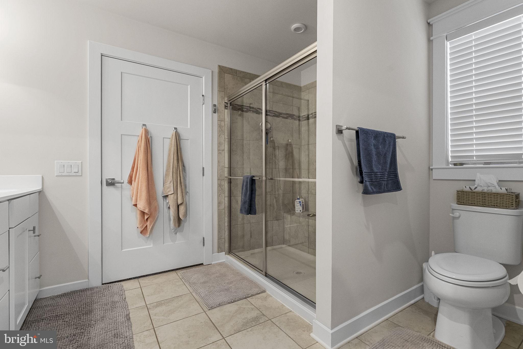 80 Senators Way Berlin, NJ 08009 - Photo 23 of 29 a bathroom with a shower and toilet