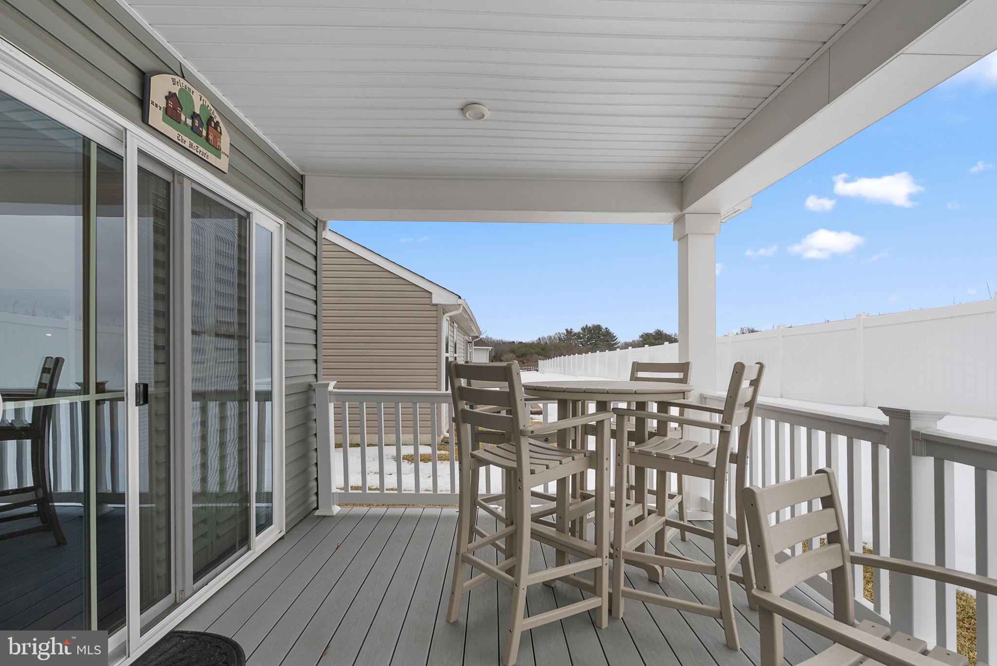 80 Senators Way Berlin, NJ 08009 - Photo 26 of 29 a view of a chairs and table in the balcony