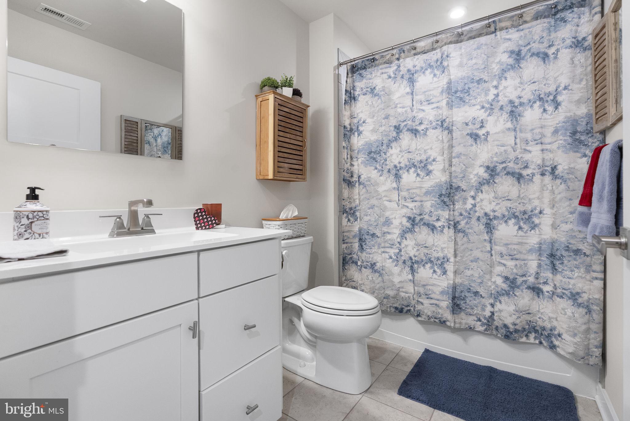 80 Senators Way Berlin, NJ 08009 - Photo 10 of 29 a bathroom with a sink toilet and shower