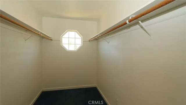 a view of small space with racks on the wall