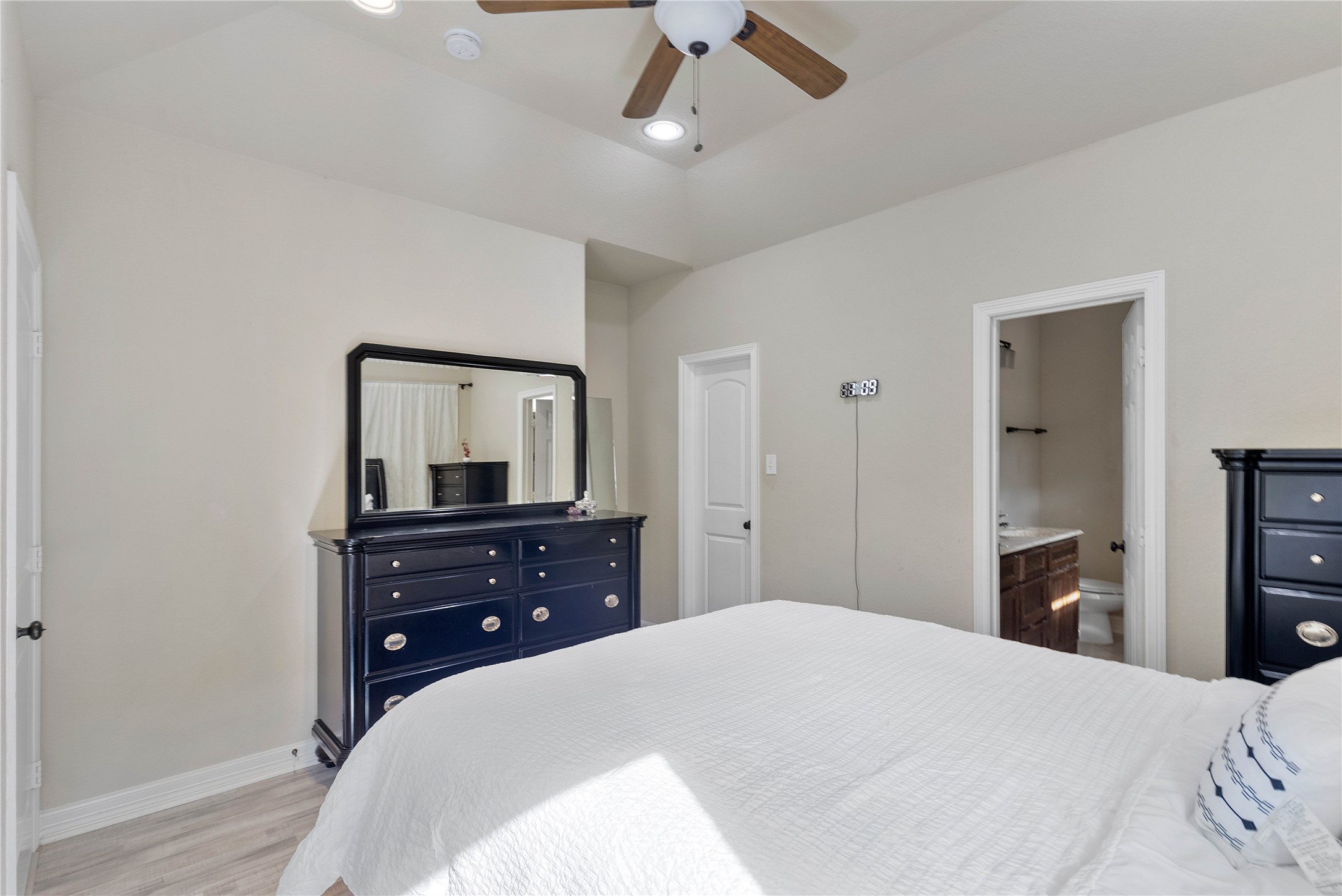 23741 Briar Tree Drive Porter, TX 77365 - Photo 20 of 36 a bedroom with a bed and a dresser