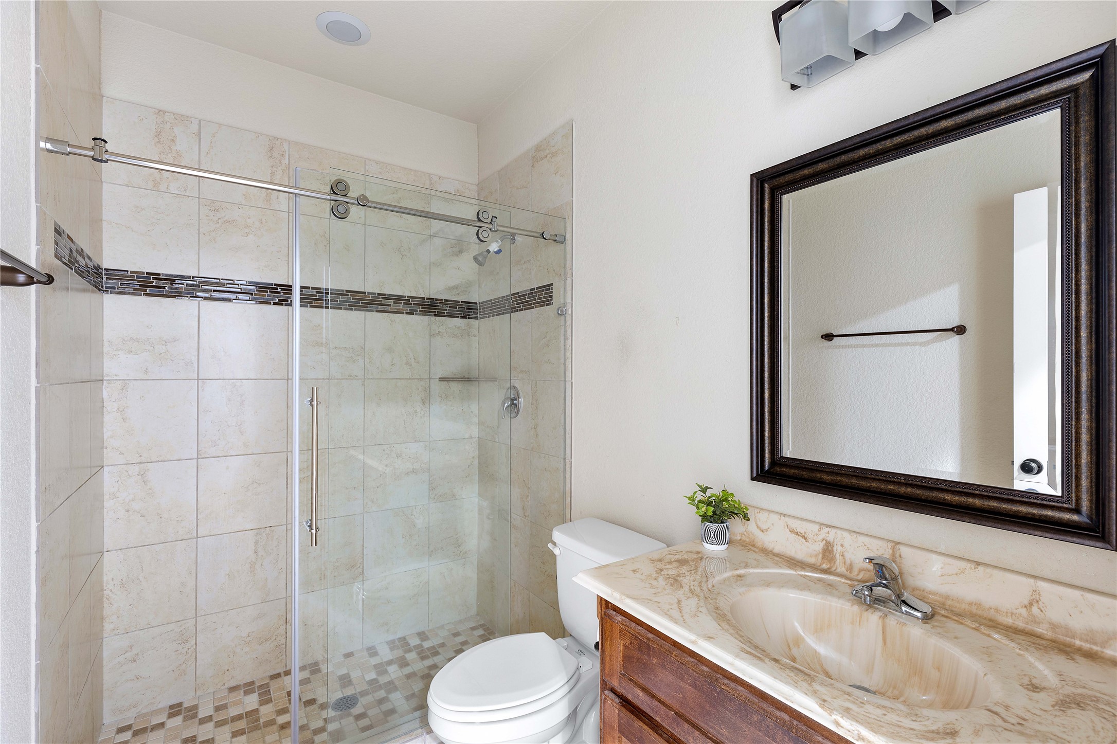 23741 Briar Tree Drive Porter, TX 77365 - Photo 23 of 36 a bathroom with a sink vanity granite toilet and shower
