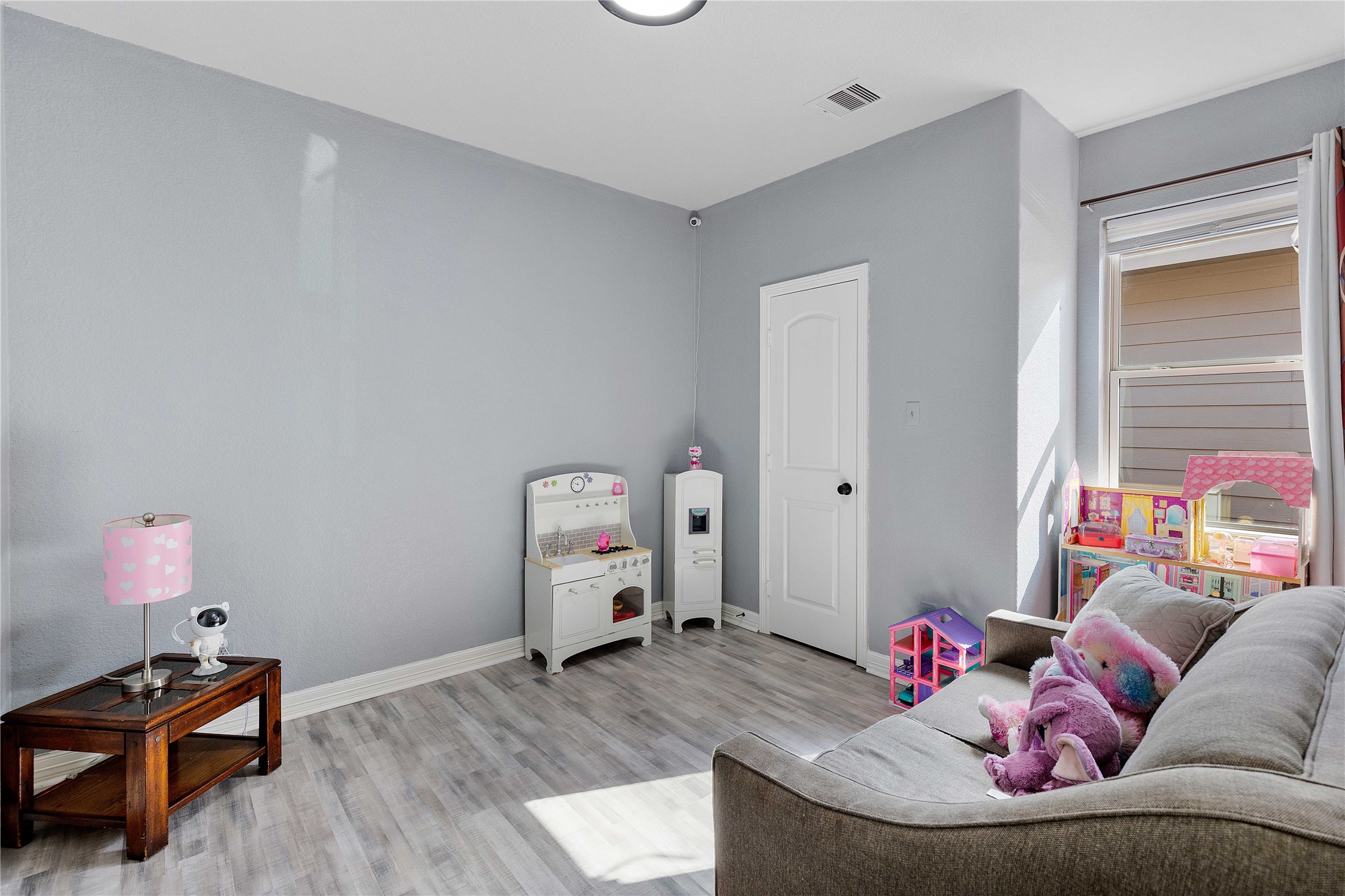 23741 Briar Tree Drive Porter, TX 77365 - Photo 26 of 36 a living room with furniture and a wooden floor