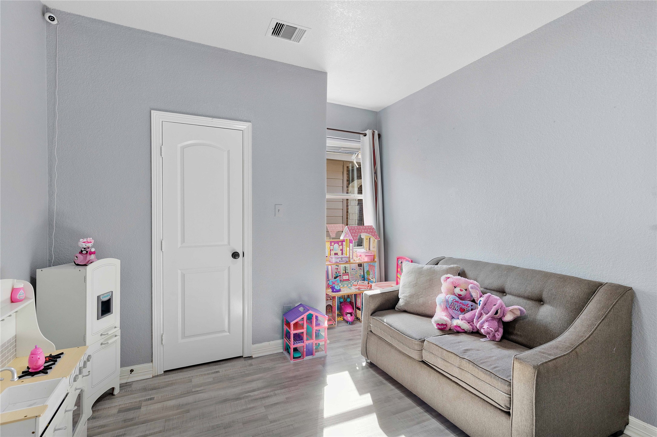 23741 Briar Tree Drive Porter, TX 77365 - Photo 27 of 36 a living room with furniture and wooden floor
