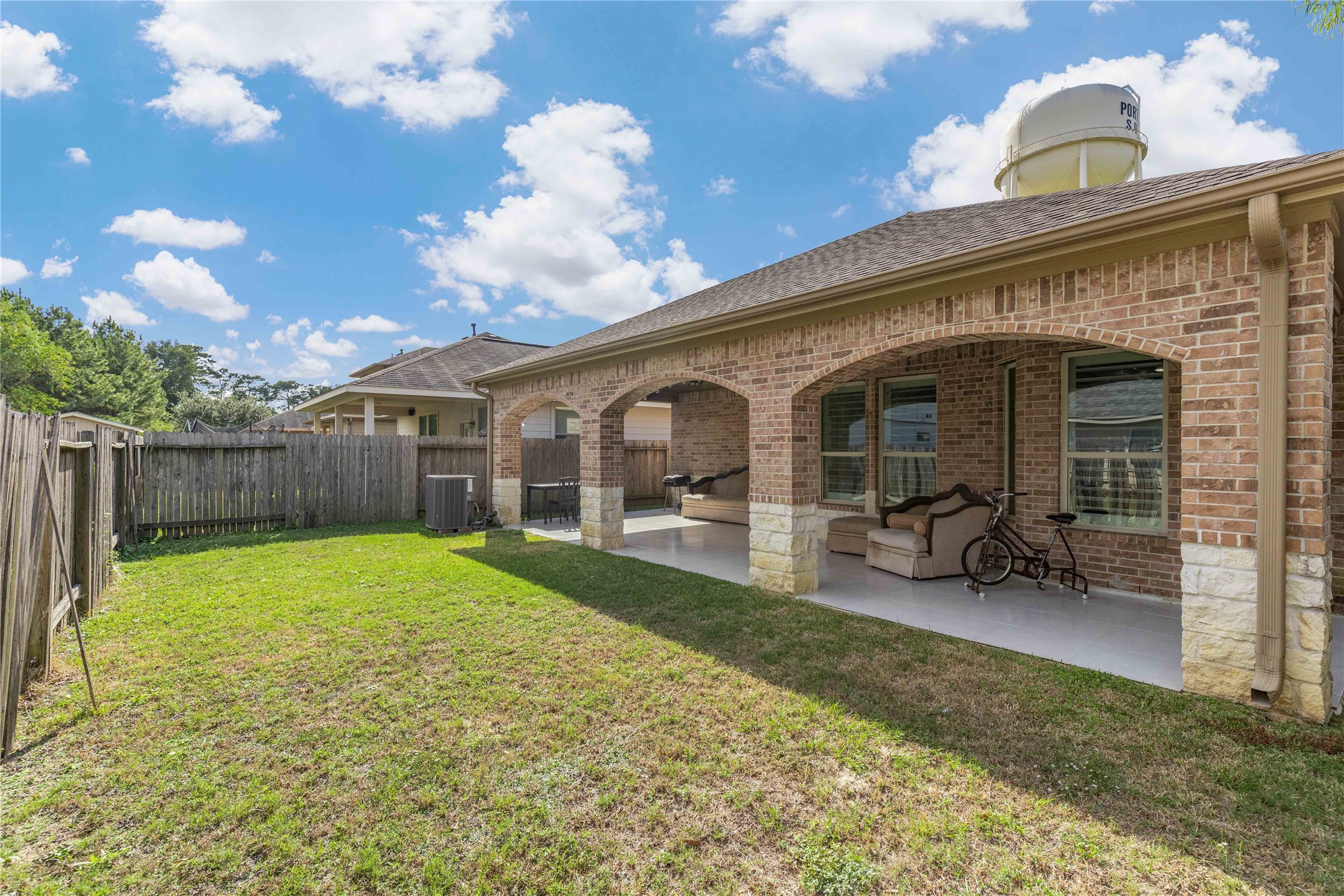 23741 Briar Tree Drive Porter, TX 77365 - Photo 30 of 36 a view of a house with backyard porch and sitting area