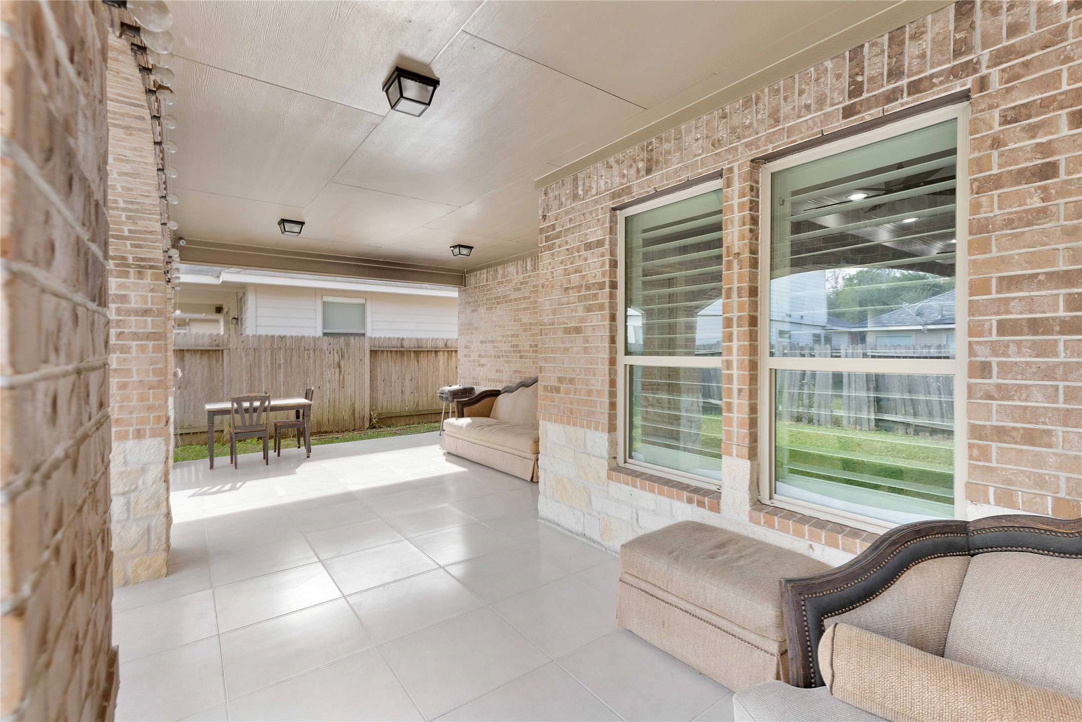 23741 Briar Tree Drive Porter, TX 77365 - Photo 31 of 36 a living room with furniture and a large window