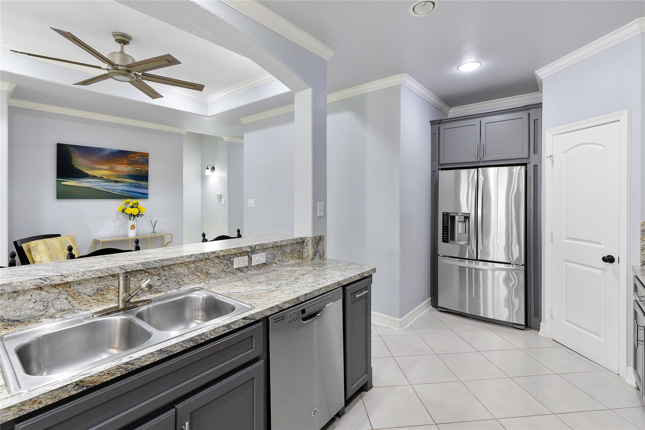 23741 Briar Tree Drive Porter, TX 77365 - Photo 5 of 36 a kitchen with stainless steel appliances granite countertop a sink a refrigerator and a granite counter tops