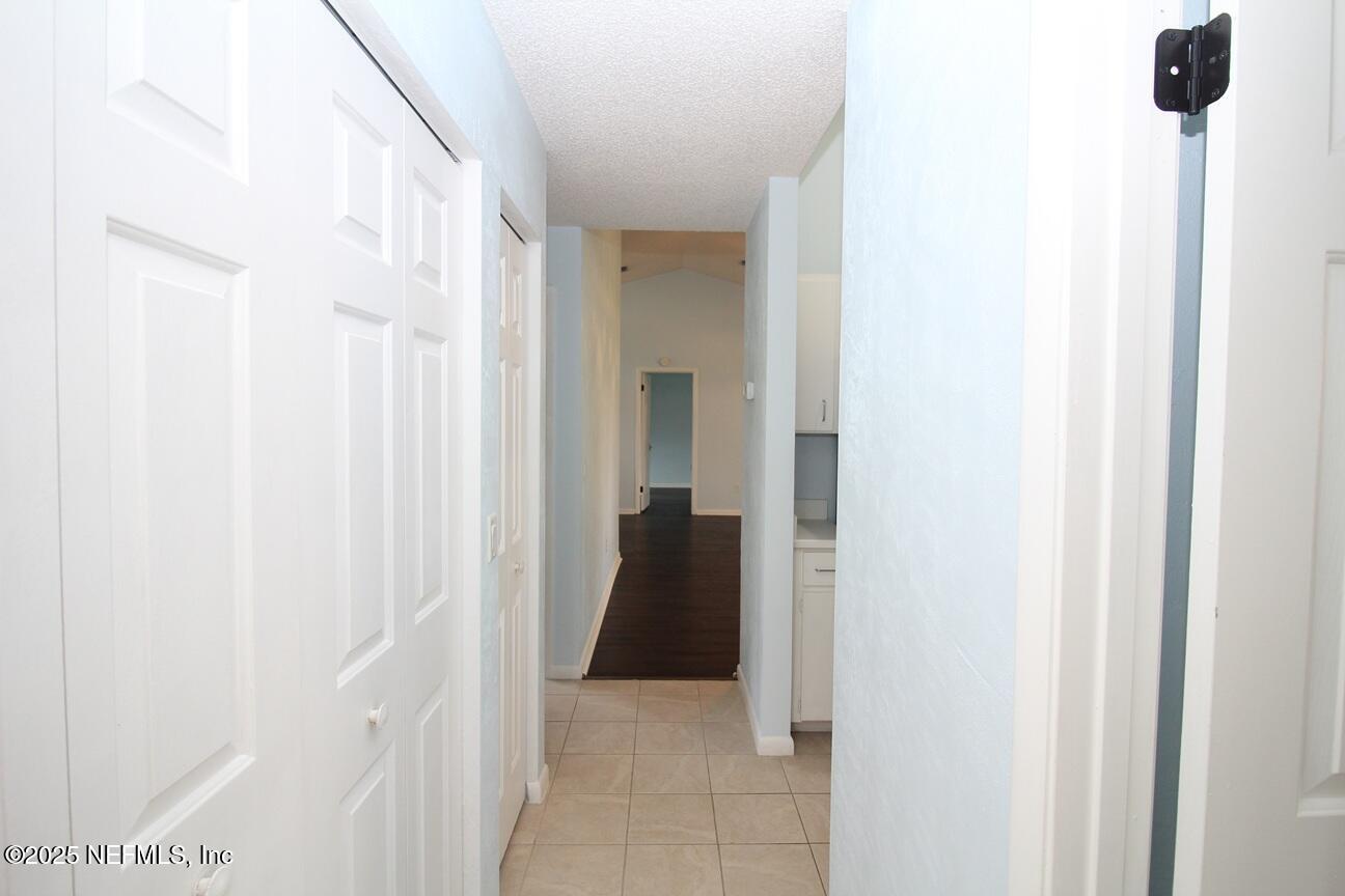 48 Westover Lane Palm Coast, FL 32164 - Photo 15 of 20 a view of a hallway
