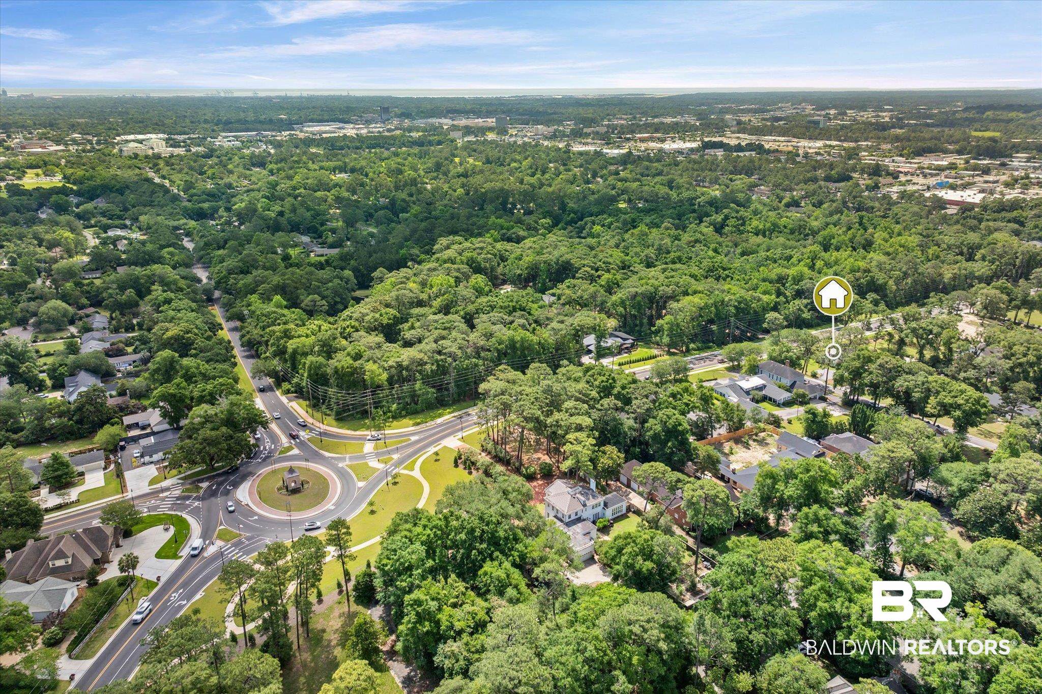 4 Turnout Lane Mobile, AL 36608 - Photo 48 of 53 Residential area featuring extensive mature tree canopy and a prominent traffic roundabout