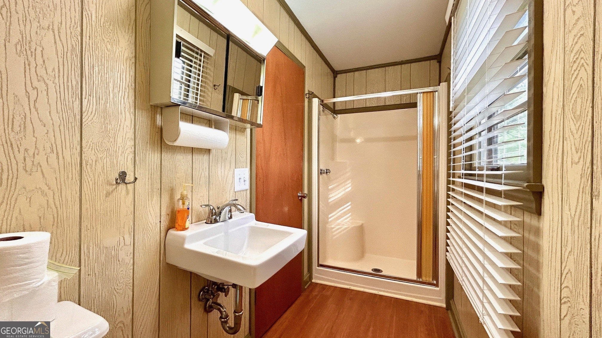 67 Dixie Park Drive Northwest Rome, GA 30165 - Photo 12 of 37 a bathroom with a sink a toilet a mirror and shower
