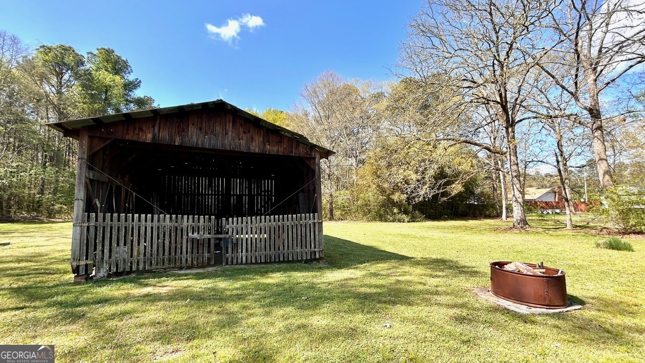 67 Dixie Park Drive Northwest Rome, GA 30165 - Photo 22 of 37 a view of an outdoor space and a yard