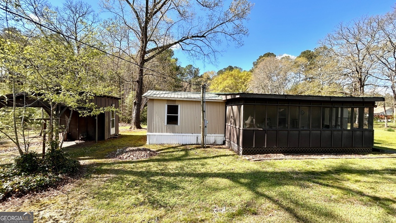 67 Dixie Park Drive Northwest Rome, GA 30165 - Photo 24 of 37 a view of a house with a yard