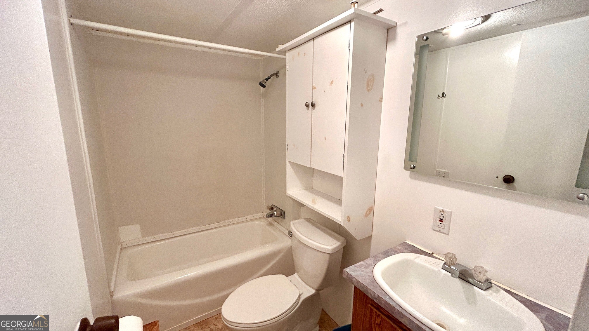 67 Dixie Park Drive Northwest Rome, GA 30165 - Photo 32 of 37 a bathroom with a sink toilet and shower