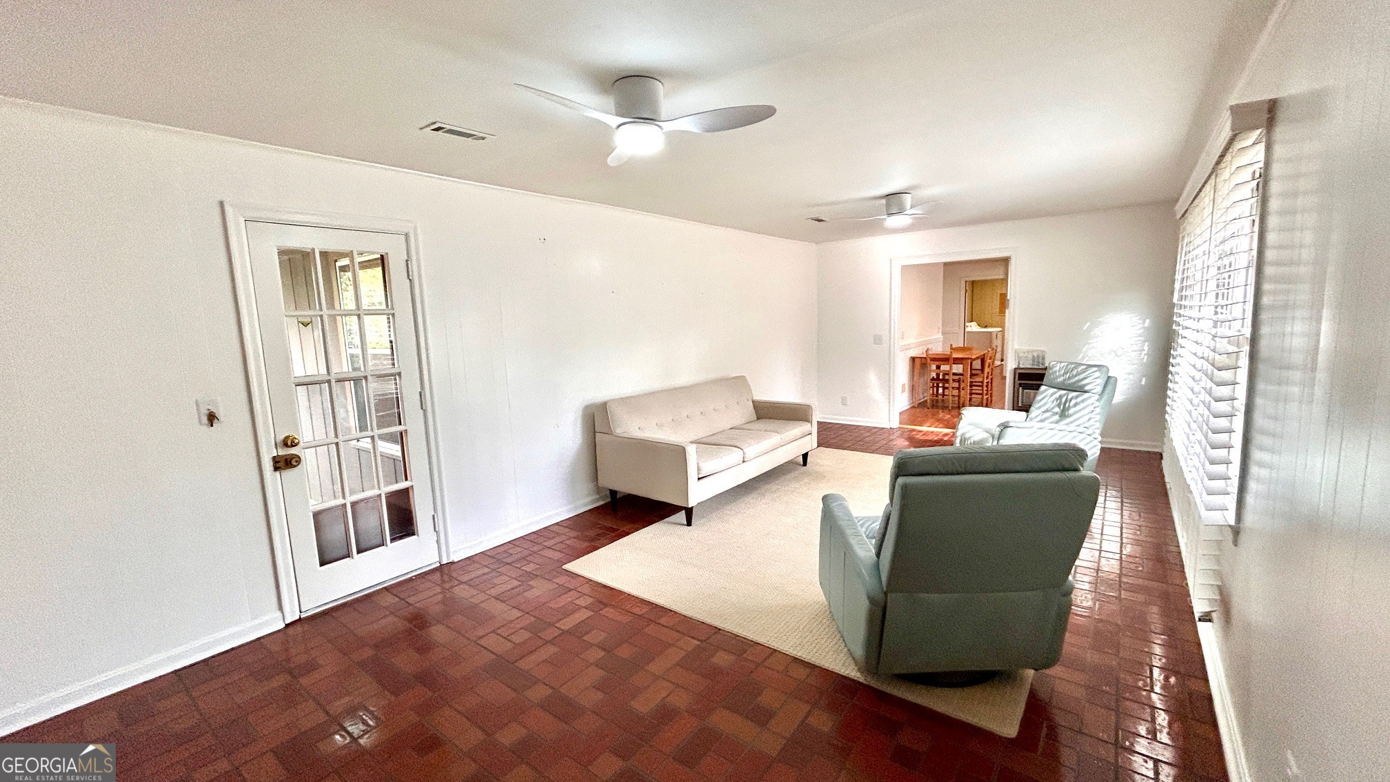 67 Dixie Park Drive Northwest Rome, GA 30165 - Photo 7 of 37 a living room with furniture and a large window