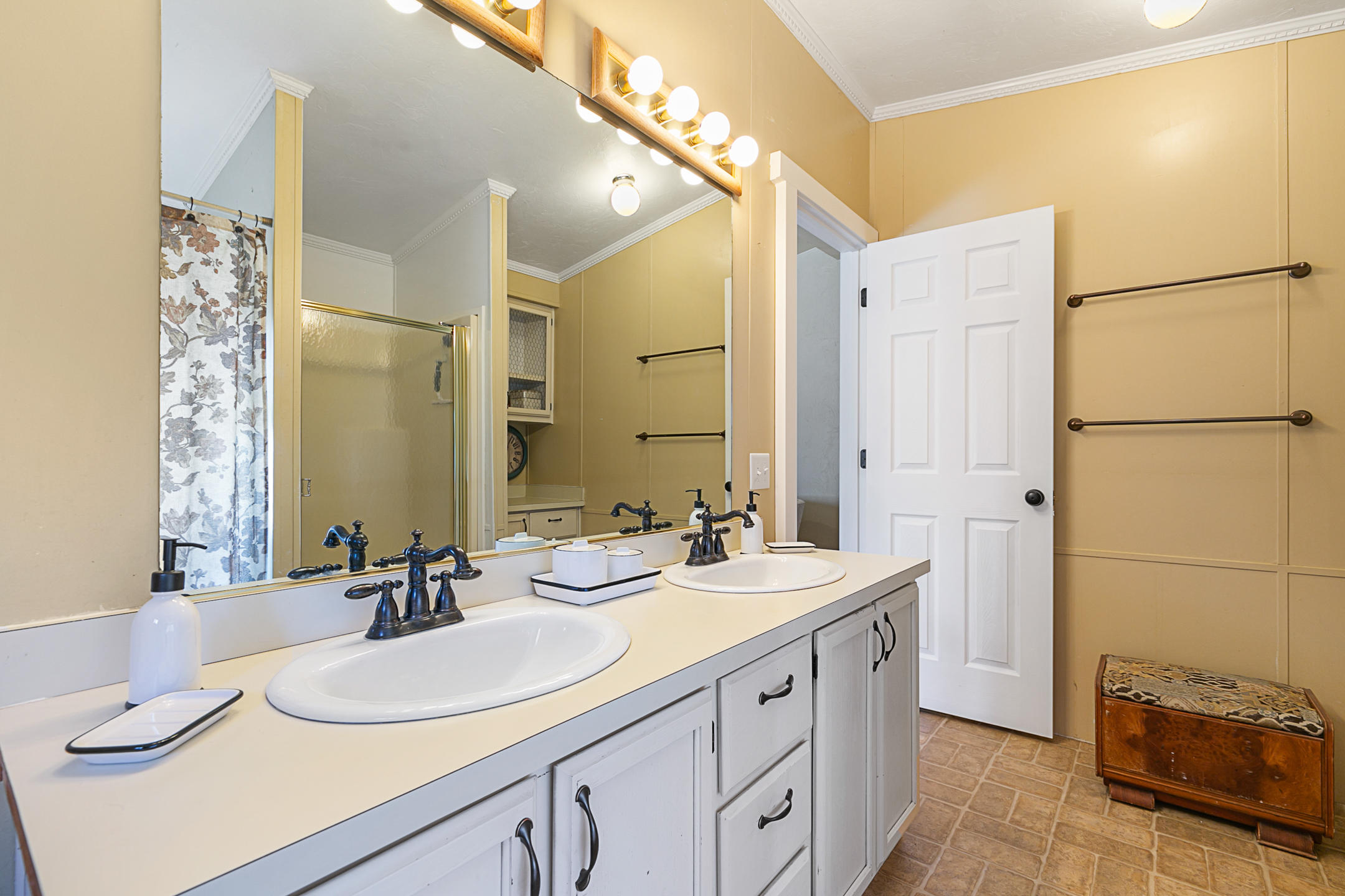 64281 Deschutes Market Road Bend, OR 97701 - Photo 16 of 43 a bathroom with a double vanity sink mirror and double