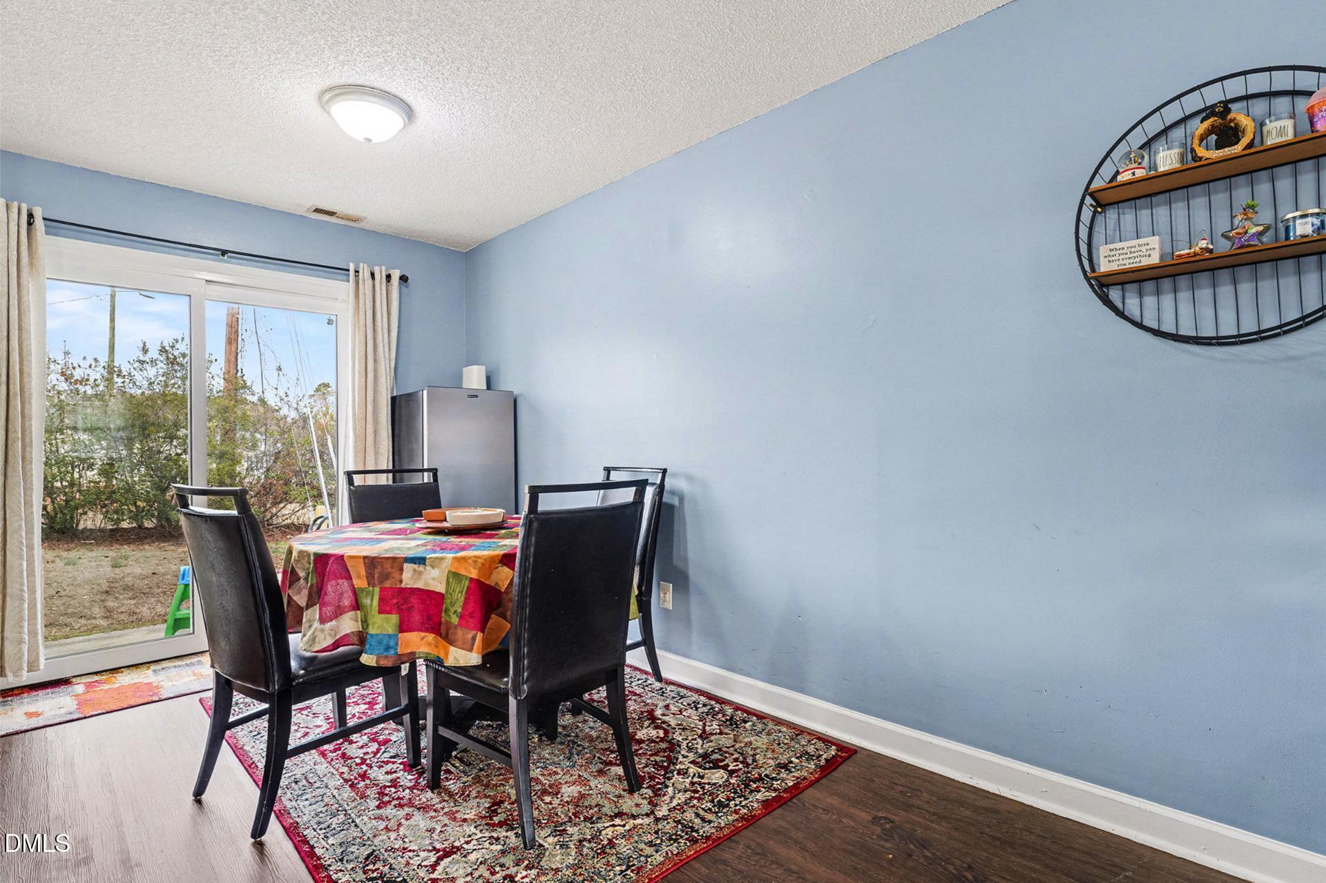 5103 Jimmy Ridge Place Raleigh, NC 27610 - Photo 11 of 29 a view of a workspace with furniture and a window