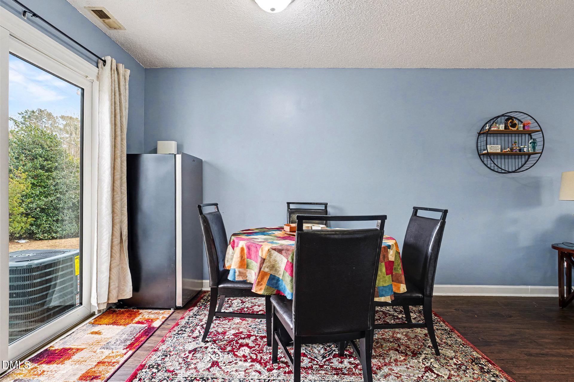 5103 Jimmy Ridge Place Raleigh, NC 27610 - Photo 10 of 29 a workspace with furniture and a window