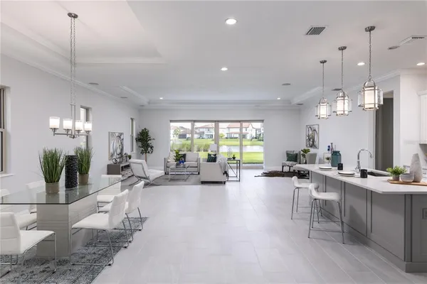 a very nice looking living room with a large window and furniture