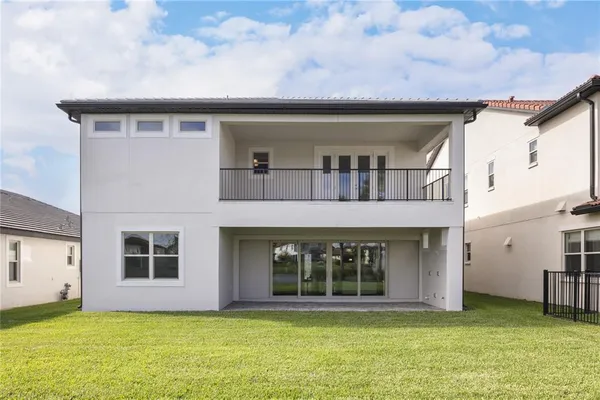 a view of front door and yard