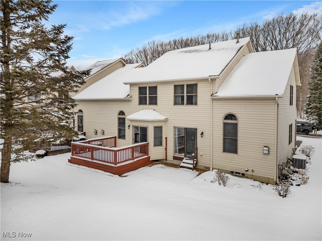 1033 Parsons Road Grafton, OH 44044 - Photo 22 of 25 Snow covered rear of property with a deck