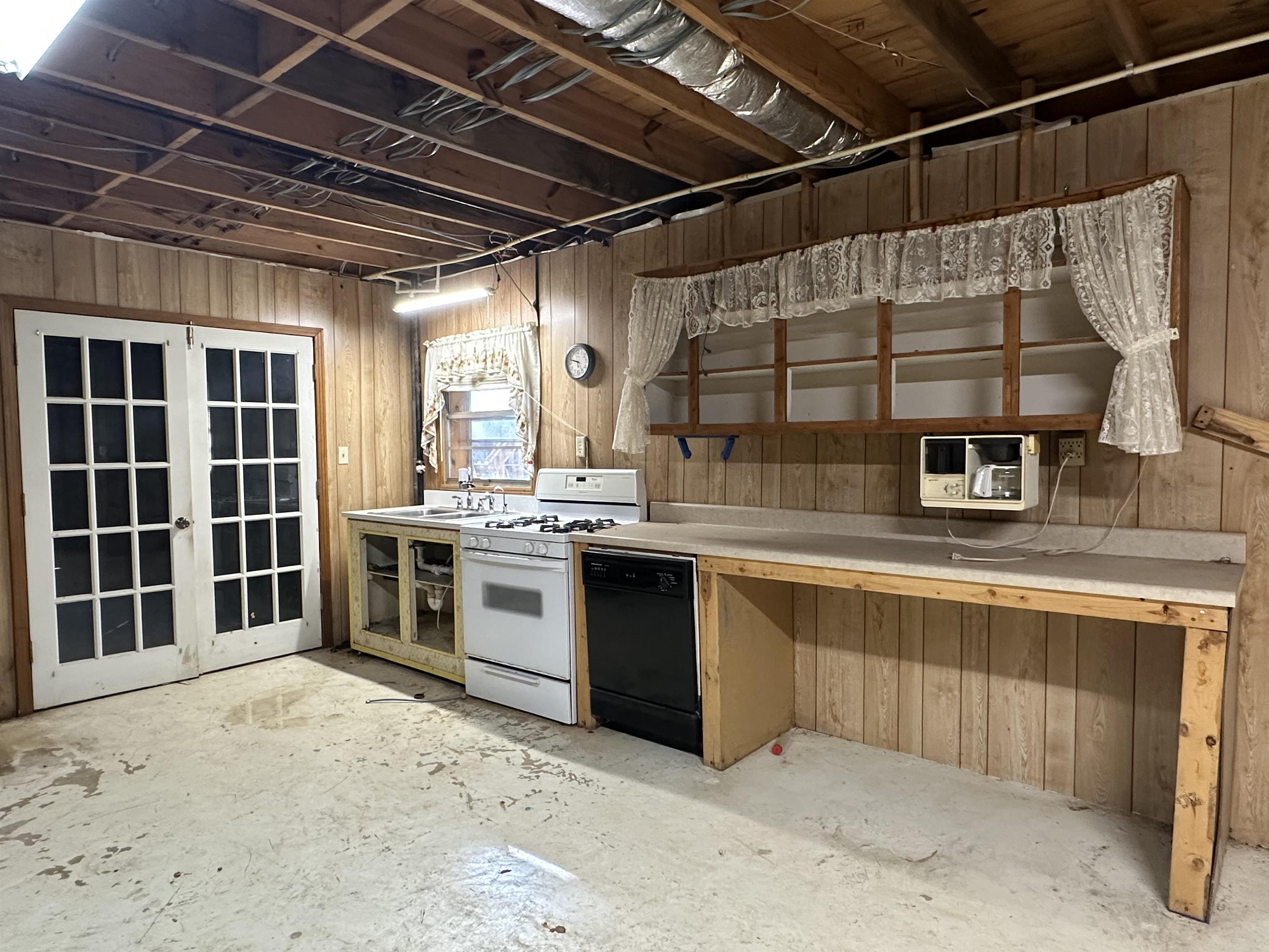 298 Matlock Road Ramer, TN 38367 - Photo 10 of 17 a kitchen with a stove and a sink
