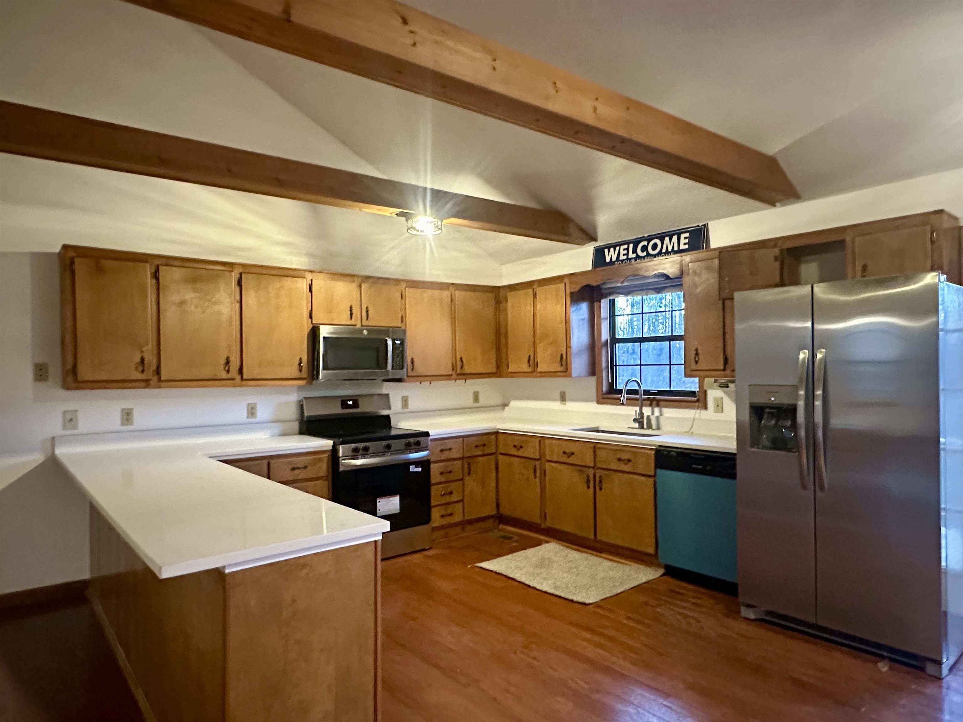 298 Matlock Road Ramer, TN 38367 - Photo 2 of 17 a kitchen with a sink cabinets and stainless steel appliances