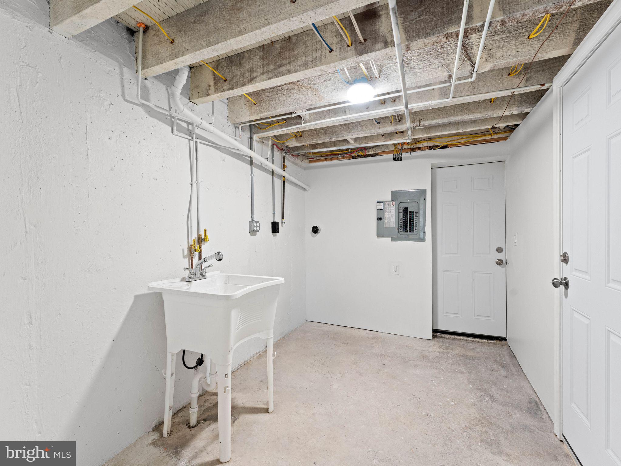 7510 Rugby Street Philadelphia, PA 19150 - Photo 20 of 22 a view of a room with table wooden floor and windows