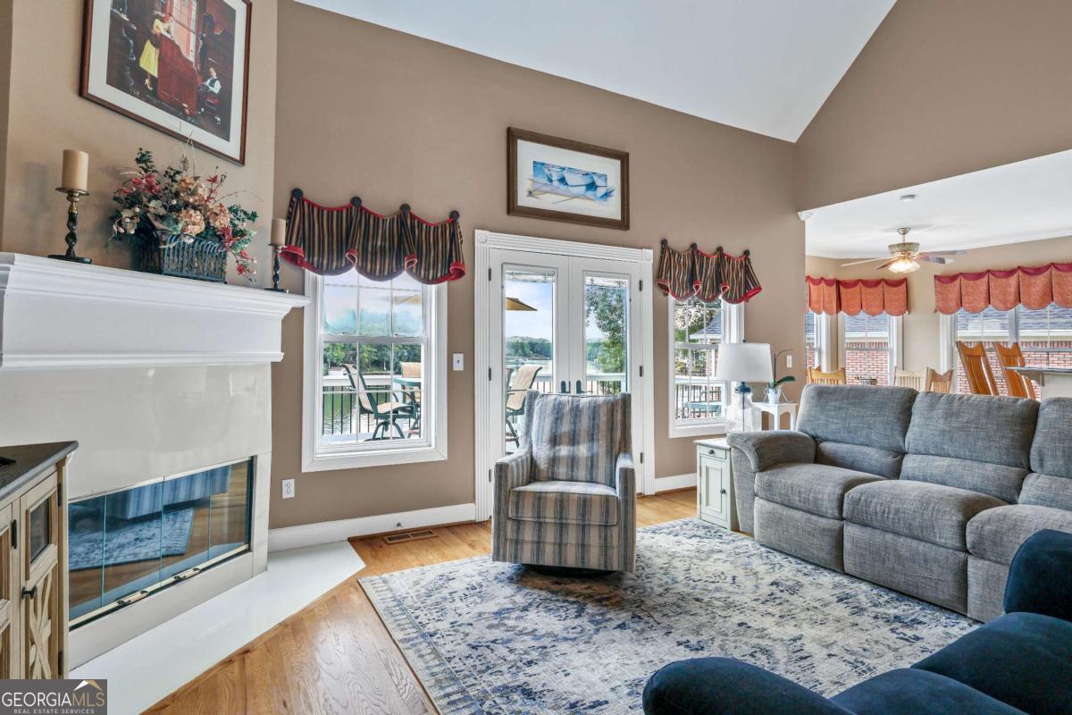 1283 Heritage Drive Villa Rica, GA 30180 - Photo 16 of 75 a living room with furniture and a fireplace