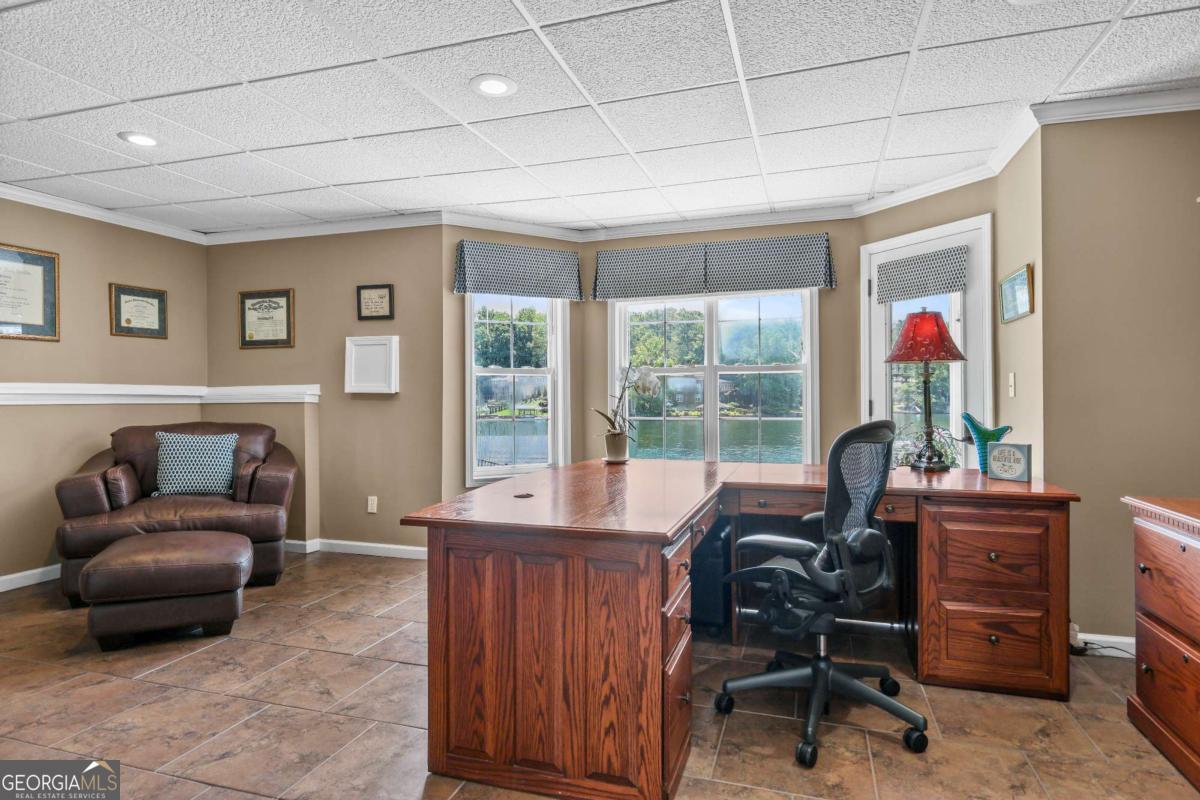 1283 Heritage Drive Villa Rica, GA 30180 - Photo 41 of 75 a living room with furniture and a window