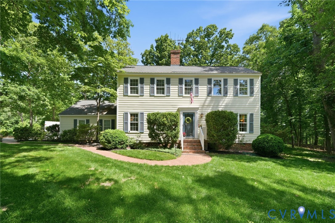 2101 Castlebridge Road Midlothian, VA 23113 - Photo 1 of 37 a front view of a house with a yard