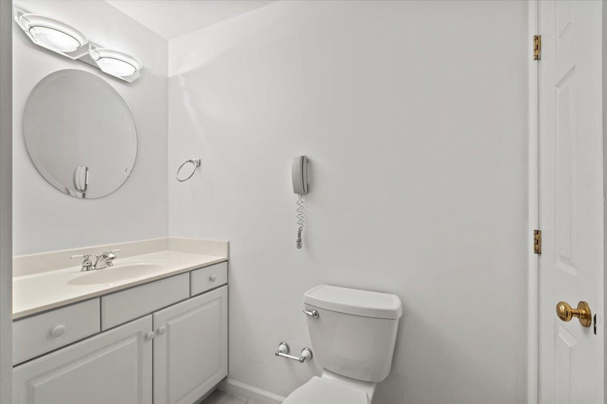 3740 Davis Road Penn Laird, VA 22846 - Photo 20 of 34 a bathroom with a toilet sink and mirror