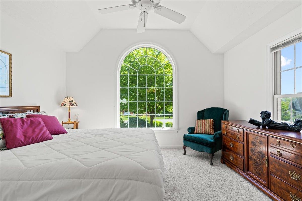 3740 Davis Road Penn Laird, VA 22846 - Photo 23 of 34 a bedroom with a bed and a chandelier