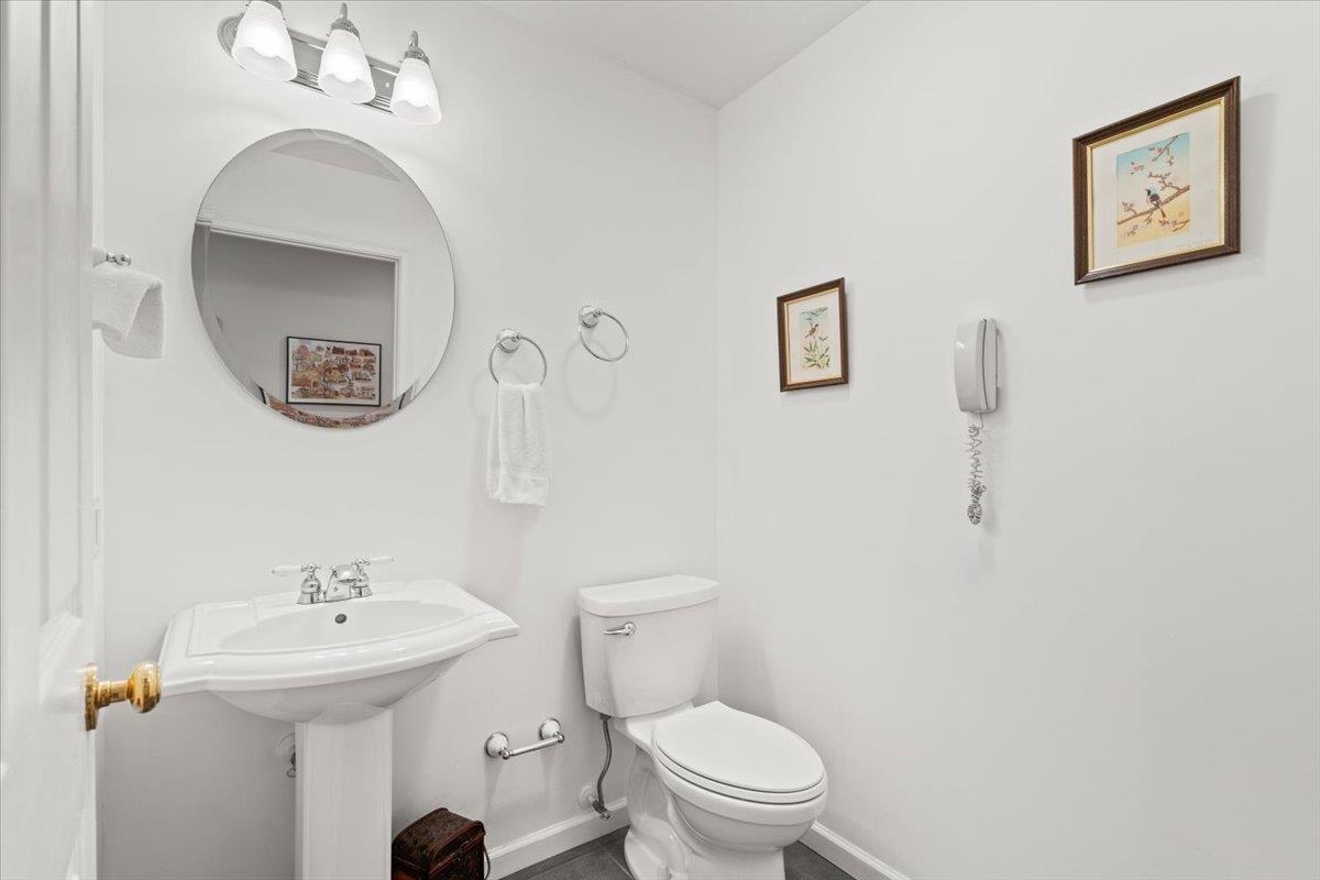 3740 Davis Road Penn Laird, VA 22846 - Photo 32 of 34 a bathroom with a toilet sink and mirror