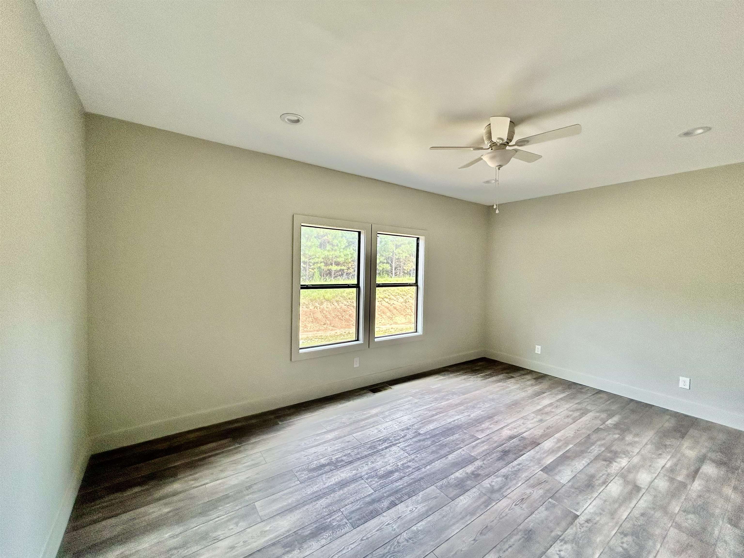 1318 Snowdown Road Iuka, MS 38852 - Photo 12 of 34 a view of an empty room with a window