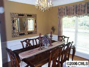 3965 Lake Shore Road South Denver, NC 28037 - Photo 3 of 8 a view of a dining room with furniture window and outside view