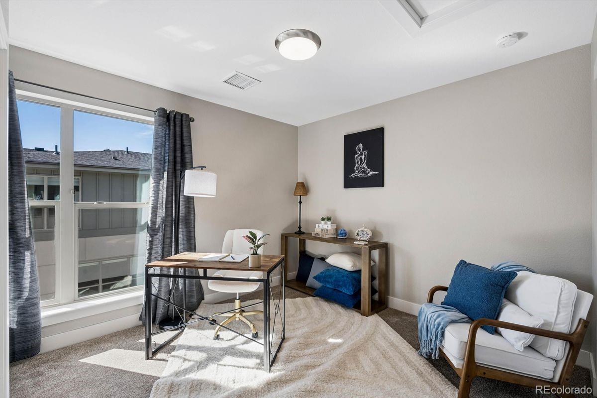 5366 Allison Street, Unit D Arvada, CO 80002 - Photo 24 of 28 a workspace with furniture and window