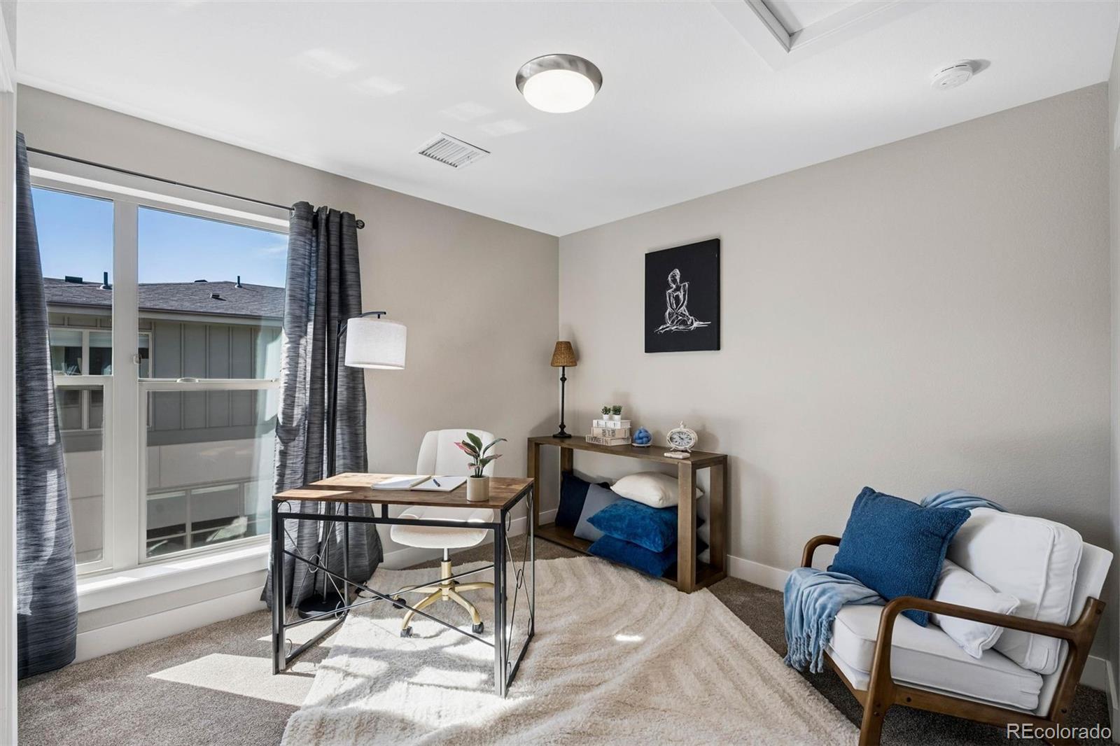 5366 Allison Street, Unit D Arvada, CO 80002 - Photo 6 of 28 a workspace with furniture and window