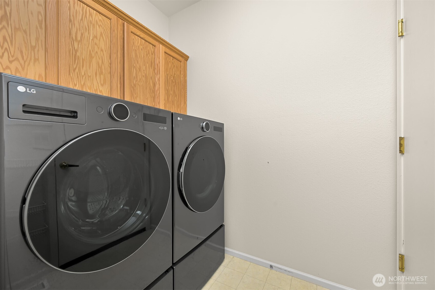 500 Fieldstone Loop, Unit 14 Lynden, WA 98264 - Photo 19 of 25 a utility room with dryer and washer