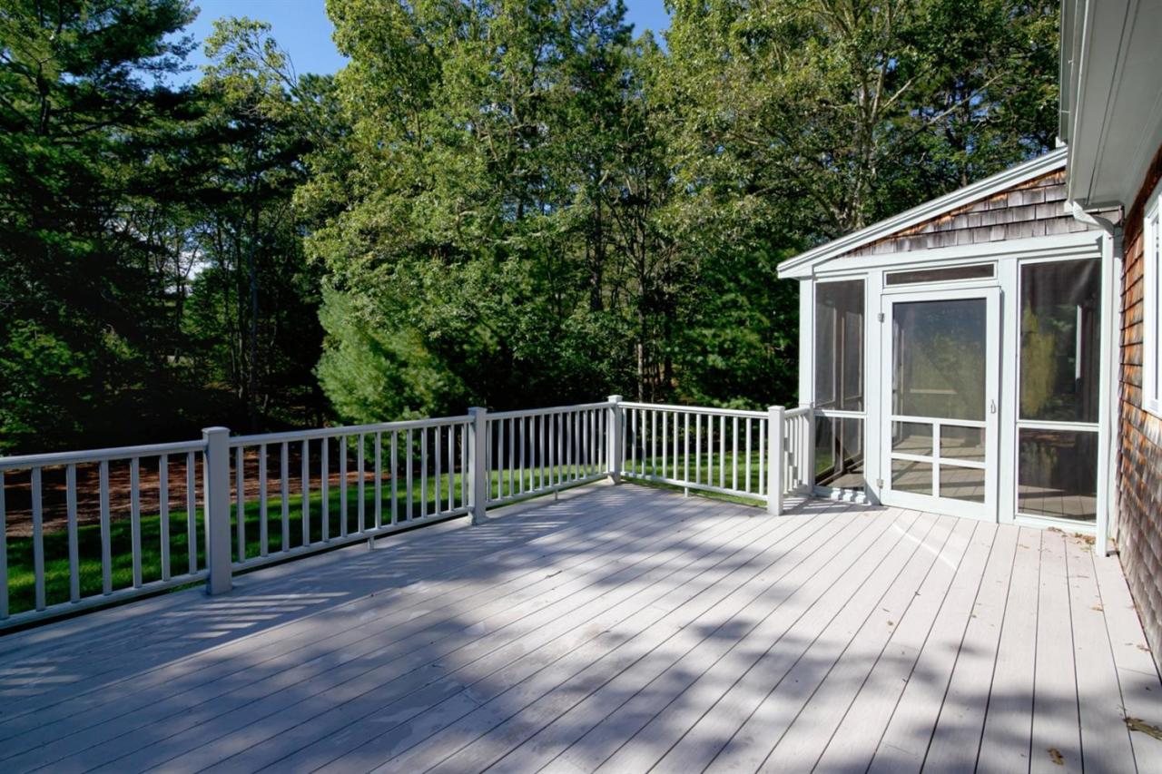 43 Piney Road Cotuit, MA 02635 - Photo 11 of 31 a view of a wooden deck