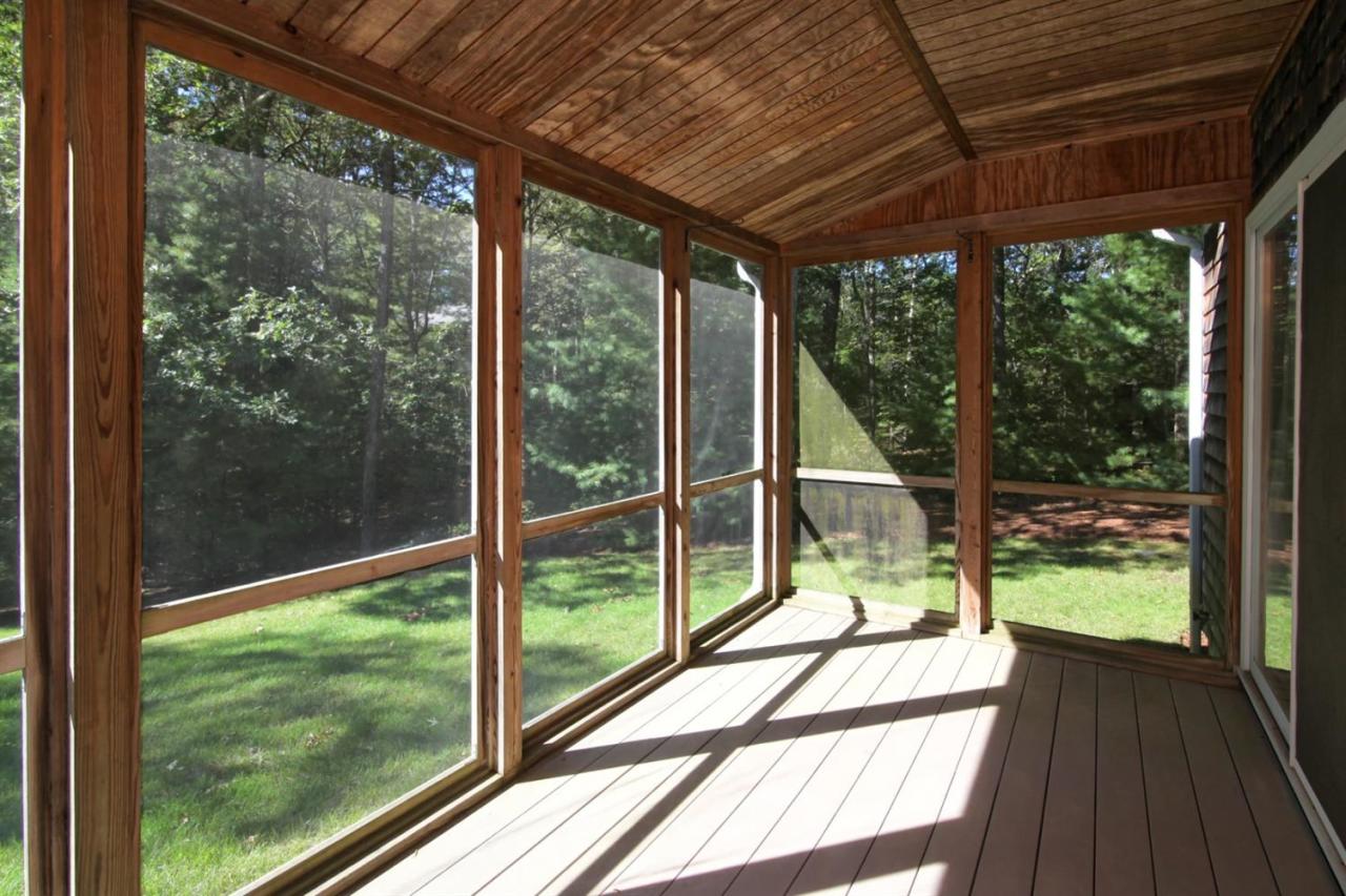 43 Piney Road Cotuit, MA 02635 - Photo 16 of 31 a view of room with porch and wooden floor