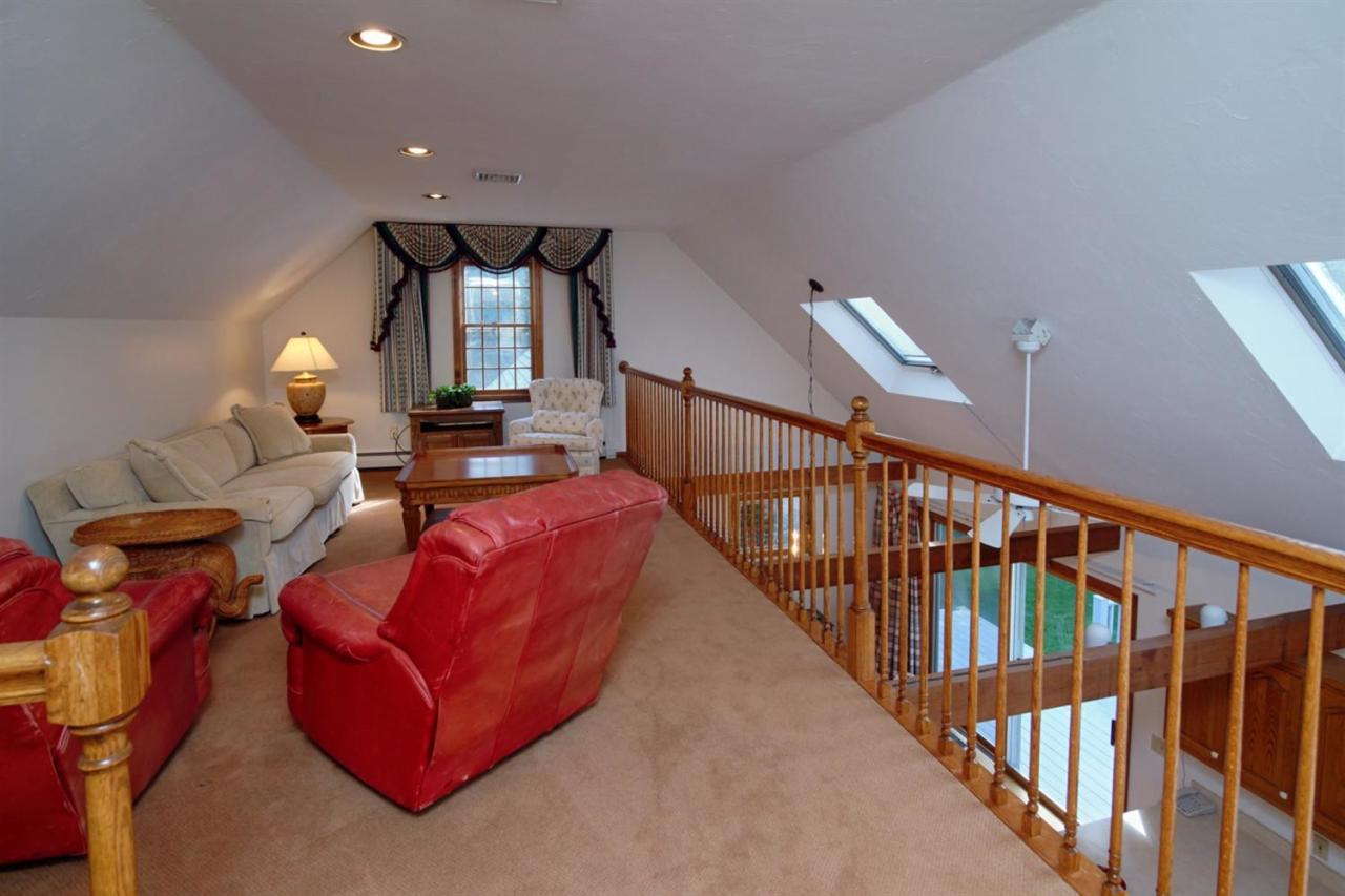 43 Piney Road Cotuit, MA 02635 - Photo 20 of 31 a living room with furniture