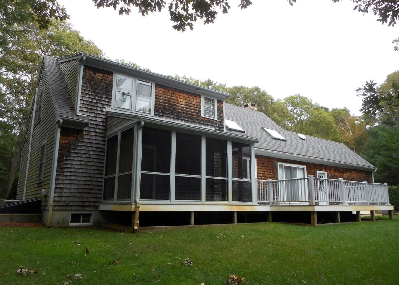 43 Piney Road Cotuit, MA 02635 - Photo 27 of 31 a view of house with yard