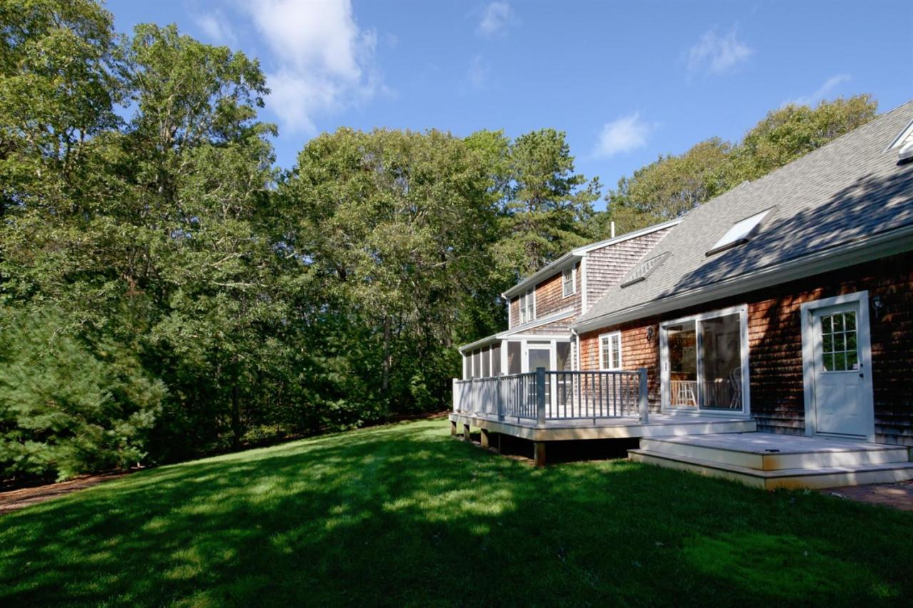 43 Piney Road Cotuit, MA 02635 - Photo 30 of 31 a view of house with backyard and swimming pool