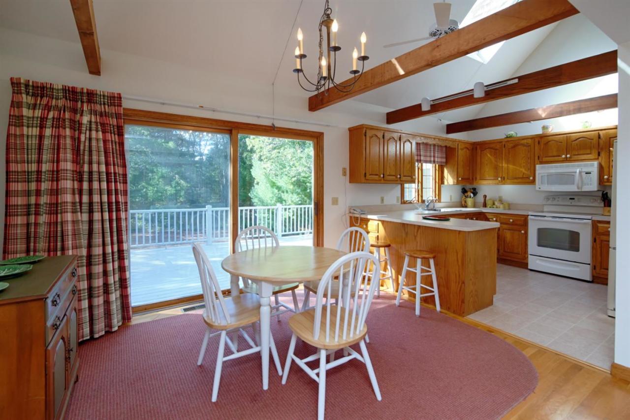 43 Piney Road Cotuit, MA 02635 - Photo 9 of 31 a dining room with furniture and window