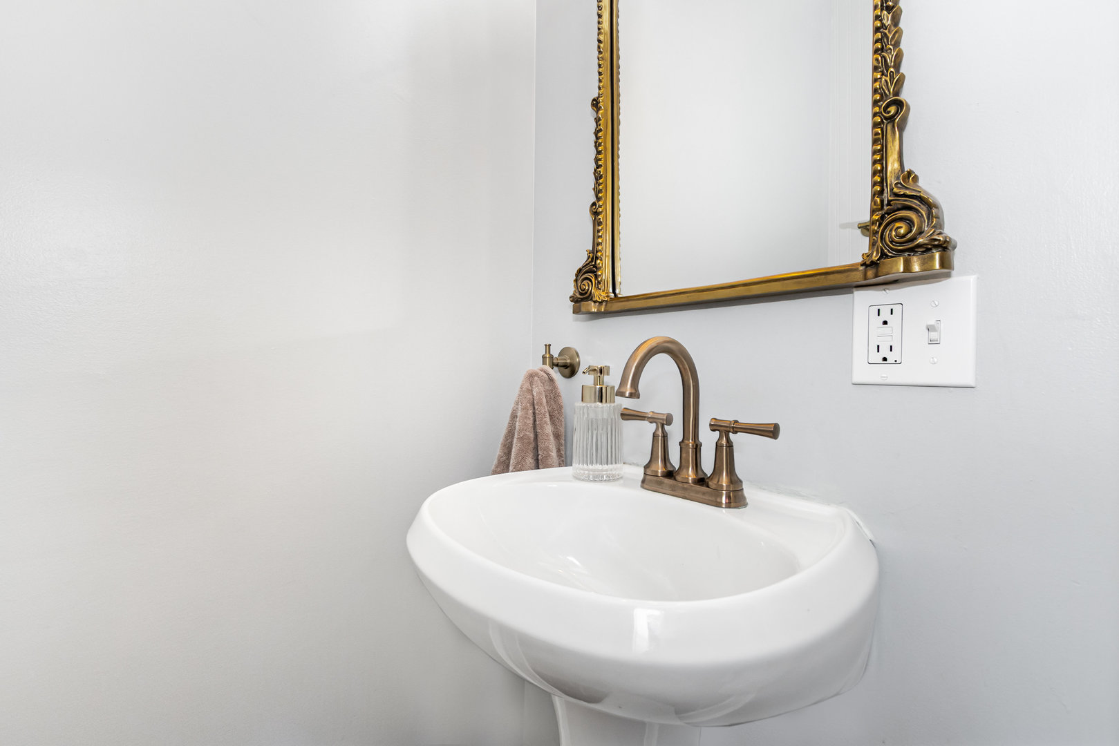 19429 Wolf Road Mokena, IL 60448 - Photo 11 of 18 a bathroom with a sink and a mirror